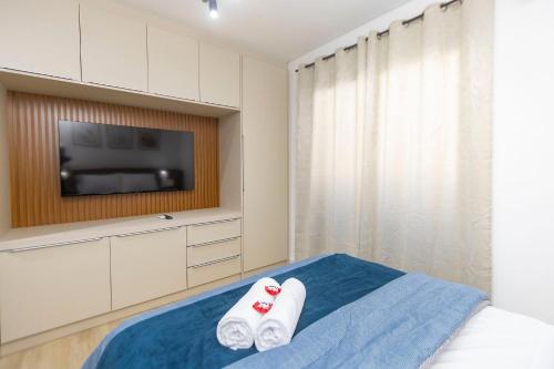 En eller flere senge i et værelse på Studio no LOG Centro de Curitiba - LOG0311