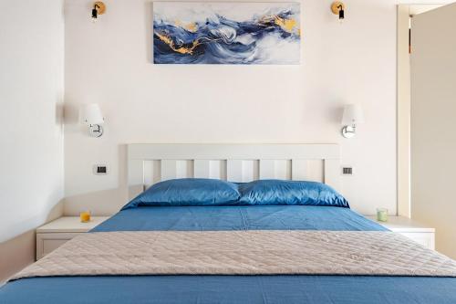 Ένα ή περισσότερα κρεβάτια σε δωμάτιο στο Rifugio d'incanto nel centro Estense