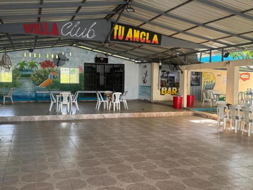 Εστιατόριο ή άλλο μέρος για φαγητό στο Villa club turístico tu ancla