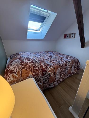 Postel nebo postele na pokoji v ubytování Le petit cocon