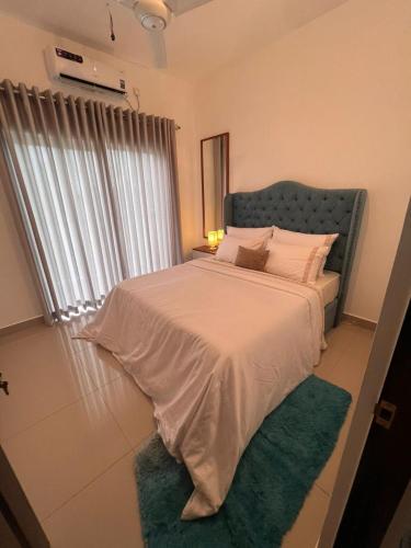 Postel nebo postele na pokoji v ubytování Santorini Resort