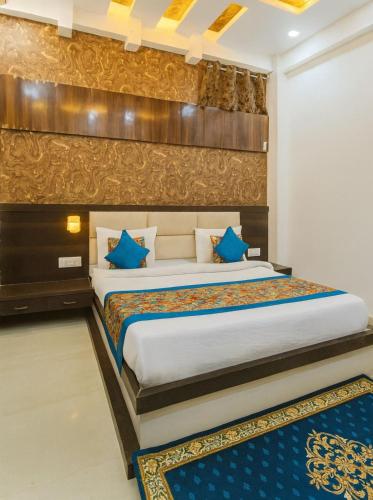 Una cama o camas en una habitación de Hotel Star Park View