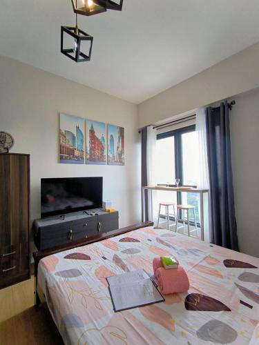 Postel nebo postele na pokoji v ubytování Lylo Pod at Vinia residences