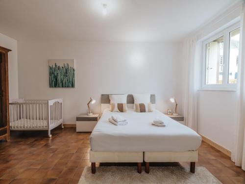 Ένα ή περισσότερα κρεβάτια σε δωμάτιο στο Holiday home just 350 m from the long sandy beach