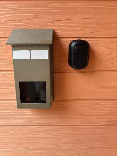 a drawer with a bird house on it at ゲストハウスharu in Shingū