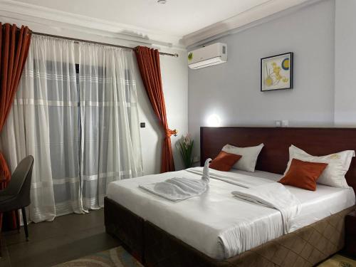 Una cama o camas en una habitación de Appart meuble