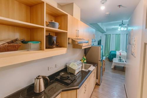 Kuchyň nebo kuchyňský kout v ubytování La Suitez 1421 l Sky Studio l 360 City l Sea View