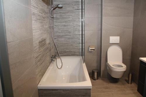 Ванная комната в Hotel La Louve