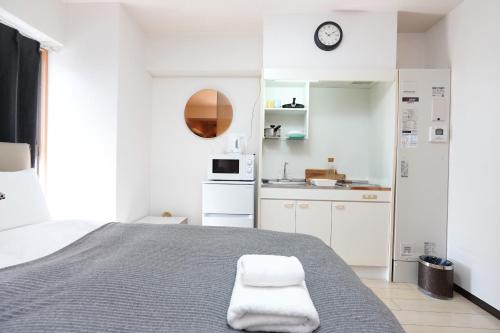 Η κουζίνα ή μικρή κουζίνα στο システムコ-ト戎本町