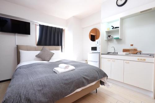 Η κουζίνα ή μικρή κουζίνα στο システムコ-ト戎本町