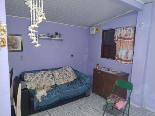 Ruang duduk di Casa Cidreira 2 quartos Costa Sol - Acomoda até 8 pessoas- Aceito Pets
