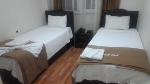Postel nebo postele na pokoji v ubytování Simal Butik Hotel