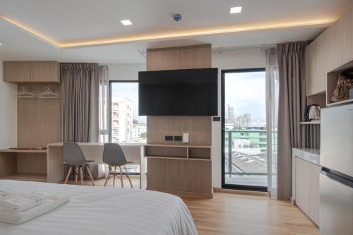 Ένα ή περισσότερα κρεβάτια σε δωμάτιο στο Solyn Hotel