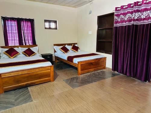 Postel nebo postele na pokoji v ubytování Festoon Villa