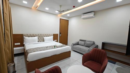 Voodi või voodid majutusasutuse Hotel Arsh Rukmani toas