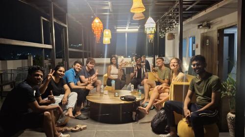 a group of people sitting in a room at Madpackers Jaipur in Jaipur