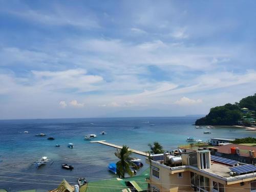 a view of a harbor with boats in the water at Dream Hotel in Puerto Galera