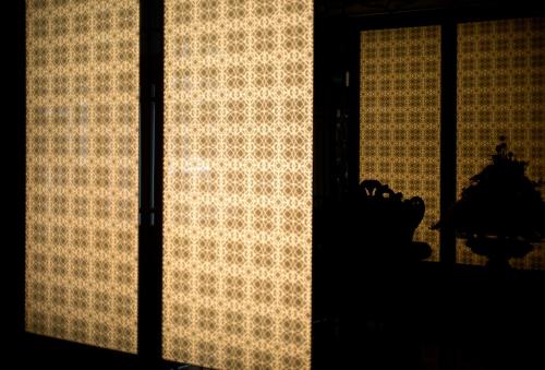 a silhouette of a window with a curtain at Venue Hotel in Singapore