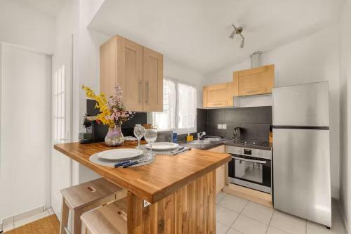 Kuchyň nebo kuchyňský kout v ubytování Havre de paix avec terrasse privé à Toulouse