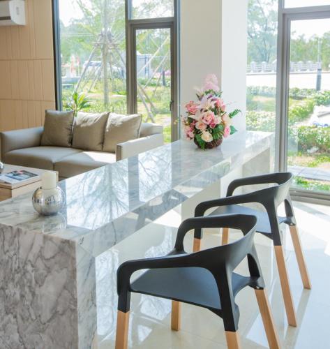 Χώρος καθιστικού στο Connext Residence Phuket