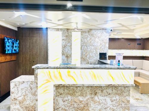 Kuchyň nebo kuchyňský kout v ubytování Hotel Keys Delight