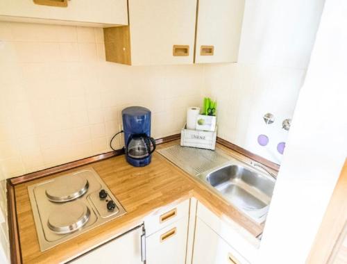 Kuchyň nebo kuchyňský kout v ubytování Jan am Strand 315