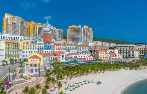 an aerial view of a city with a beach and buildings at Mi Amor Luxury Hostel located in South Island Center in Phu Quoc