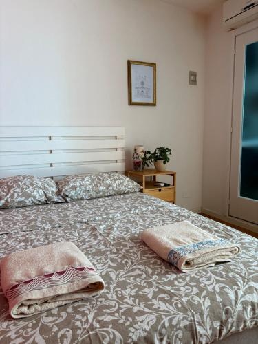 Кровать или кровати в номере Mini Appartamento in Centro Storico