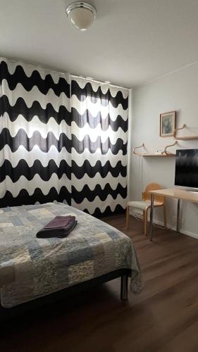 Llit o llits en una habitació de Vanha Koulu