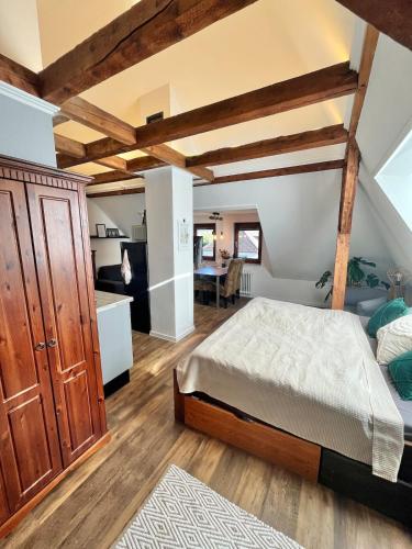 Postel nebo postele na pokoji v ubytování Loft nahe TH-OWL und der Phoenix Contact Arena