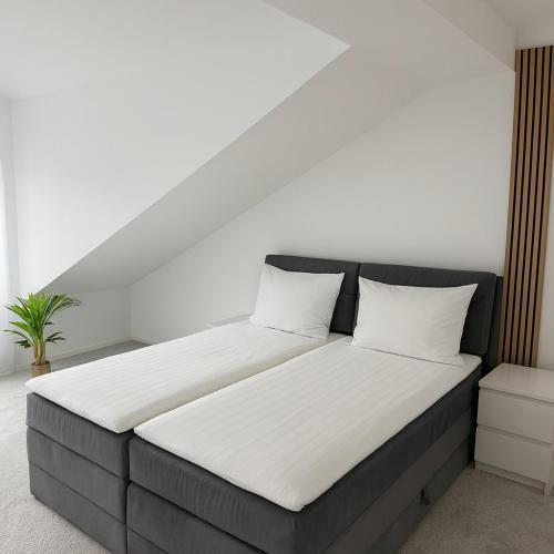 Postel nebo postele na pokoji v ubytování Rednitz Luxus House