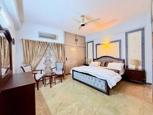 Voodi või voodid majutusasutuse Spacious 3 BHK Condo Central, Cozy & Convenient toas