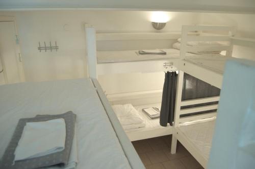 Postel nebo postele na pokoji v ubytování Hostel Dalagatan