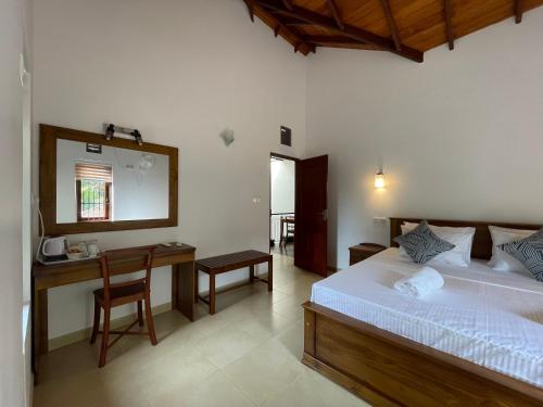Katil atau katil-katil dalam bilik di Cenreeza Airport Villa