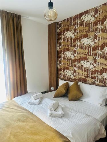 Ένα ή περισσότερα κρεβάτια σε δωμάτιο στο JiV luxury apartment i spa