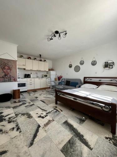 Ένα ή περισσότερα κρεβάτια σε δωμάτιο στο Bellissimo apartment Naxos