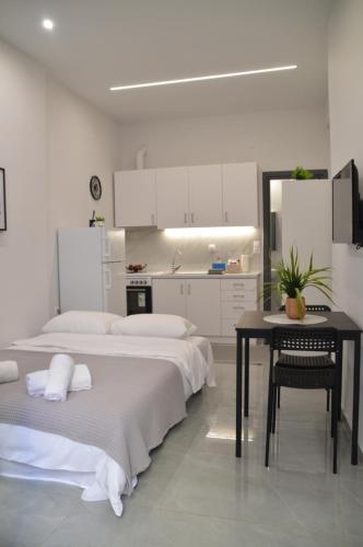 Katil atau katil-katil dalam bilik di Silver Gray Retreat