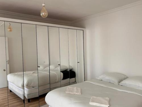 Ένα ή περισσότερα κρεβάτια σε δωμάτιο στο Hyper Centre Caen T3 Spacious Perfect Location