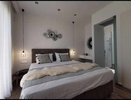 Ένα ή περισσότερα κρεβάτια σε δωμάτιο στο Villa Chryso