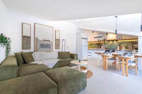 a living room with a couch and a table at Vera home in Marmaris
