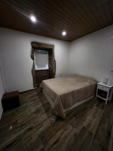 Katil atau katil-katil dalam bilik di A Casa da Aldeia 1 Belmonte