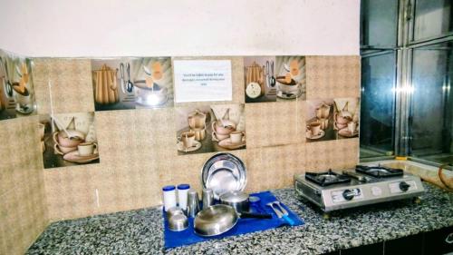 Η κουζίνα ή μικρή κουζίνα στο Aaranya Retreat by Agrawal's