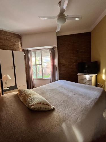 En eller flere senge i et værelse på La Casa del Paraná - San Pedro