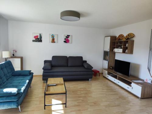 Coin salon dans l'établissement Gemütliche 2,5- Zimmer- Wohnung am Wasserturm in Rottweil