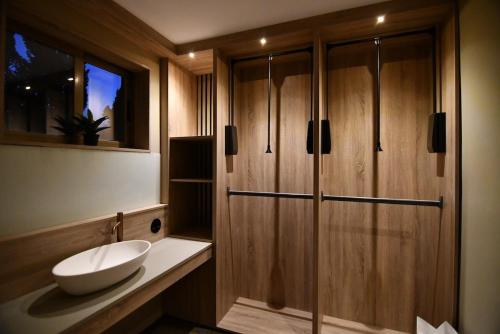 a bathroom with a sink and a toilet in it at Envia Golf Villa with private Pool, Garden and Cinema in Vícar