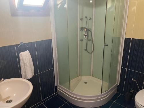 a bathroom with a shower and a sink at Kybele Nature Life in Edremit