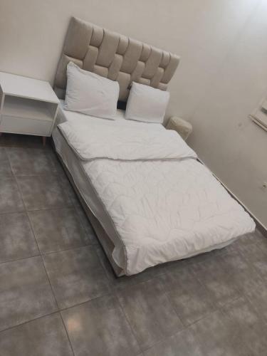 Voodi või voodid majutusasutuse Appartement de luxe toas