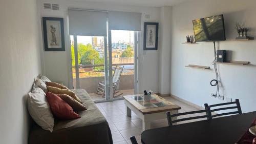 TV a/nebo společenská místnost v ubytování Departamento Boulevares