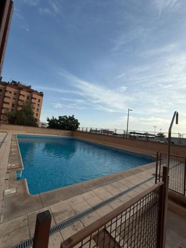 Enjoy the sun and pool in this fabulous apartment