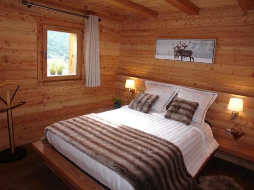 Postel nebo postele na pokoji v ubytování Chalet Pepette, Logement Calme et Élégant